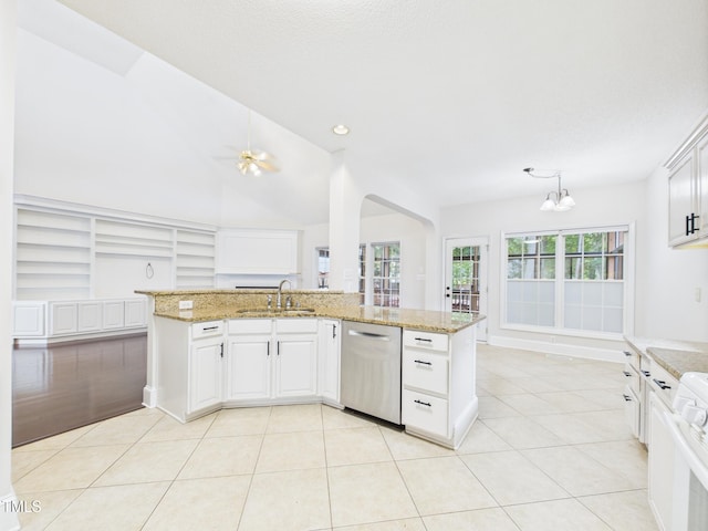 7501 Montibillo Pkwy, Durham, NC 27713 - kitchen with stainless steel dishwasher, a chandelier, light stone countertops, light tile patterned floors, and vaulted ceiling