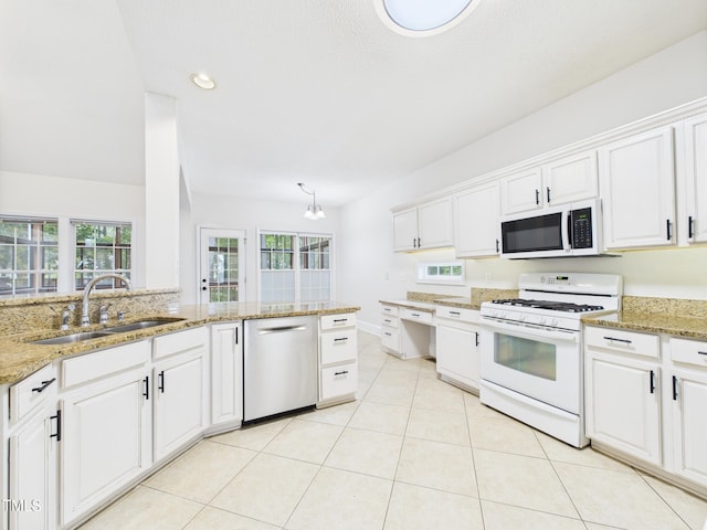 7501 Montibillo Pkwy, Durham, NC 27713 - kitchen featuring white appliances, white cabinetry, light tile patterned flooring, light stone countertops, and a chandelier
