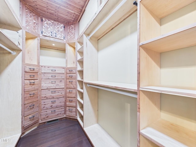 7501 Montibillo Pkwy, Durham, NC 27713 - walk in closet with dark wood finished floors