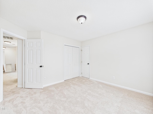 7501 Montibillo Pkwy, Durham, NC 27713 - unfurnished bedroom with carpet flooring and a closet