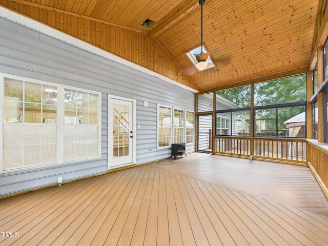 7501 Montibillo Pkwy, Durham, NC 27713 - unfurnished sunroom featuring a skylight and vaulted ceiling
