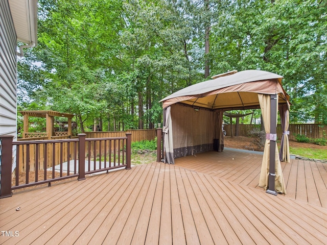 7501 Montibillo Pkwy, Durham, NC 27713 - deck with a gazebo and a fenced backyard