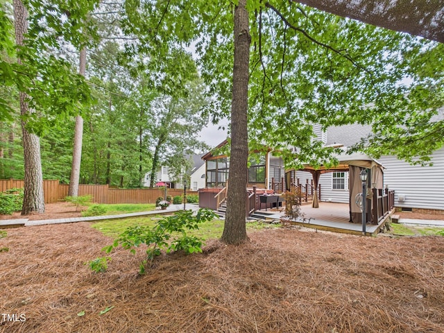 7501 Montibillo Pkwy, Durham, NC 27713 - rear view of property featuring a gazebo, a wooden deck, and roof with shingles