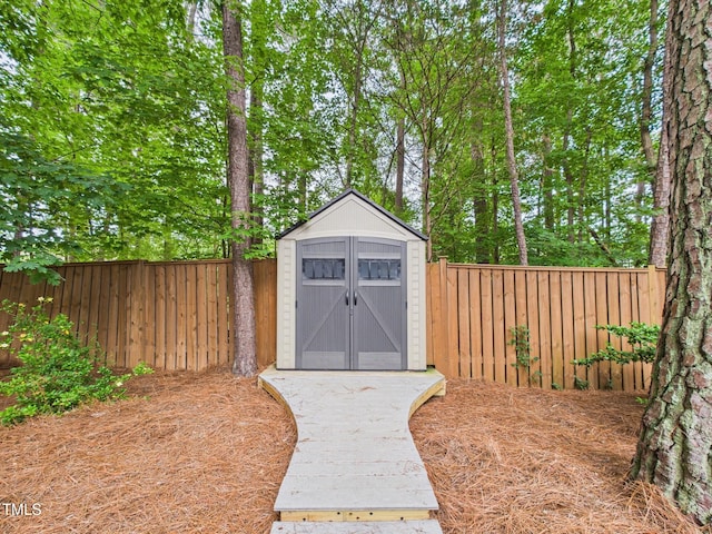 7501 Montibillo Pkwy, Durham, NC 27713 - view of shed with a fenced backyard