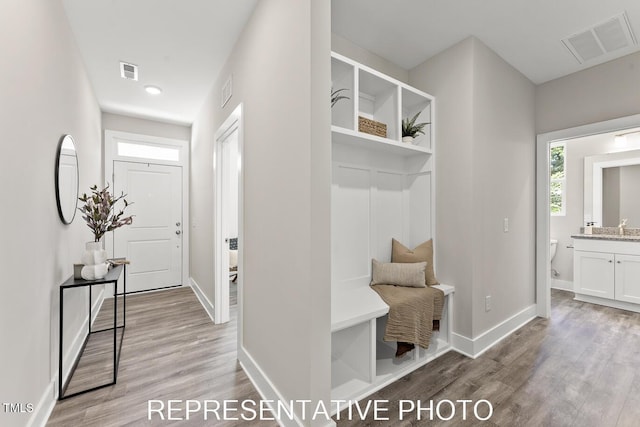 7678 New Sandy Hill Church Rd, Sims, NC 27880 - mudroom with light wood-style flooring and recessed lighting
