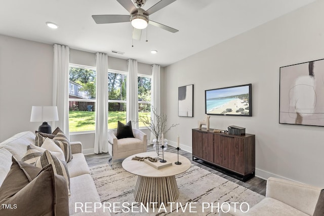 7678 New Sandy Hill Church Rd, Sims, NC 27880 - living area with wood finished floors, a ceiling fan, and recessed lighting