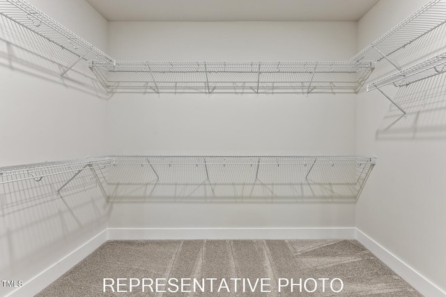 7678 New Sandy Hill Church Rd, Sims, NC 27880 - spacious closet featuring carpet