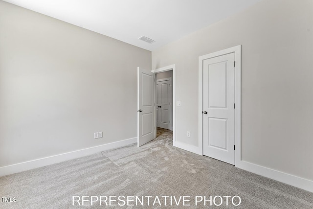 7678 New Sandy Hill Church Rd, Sims, NC 27880 - unfurnished bedroom with carpet flooring and baseboards