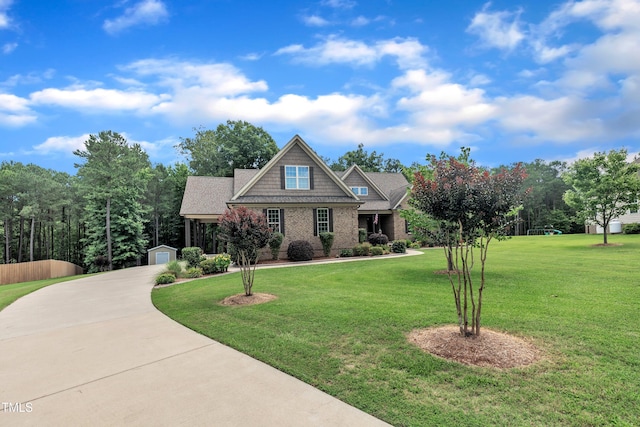 3728 Marwick Ct, Wendell, NC 27591 - craftsman inspired home featuring a front yard, an outdoor structure, concrete driveway, a garage, and brick siding