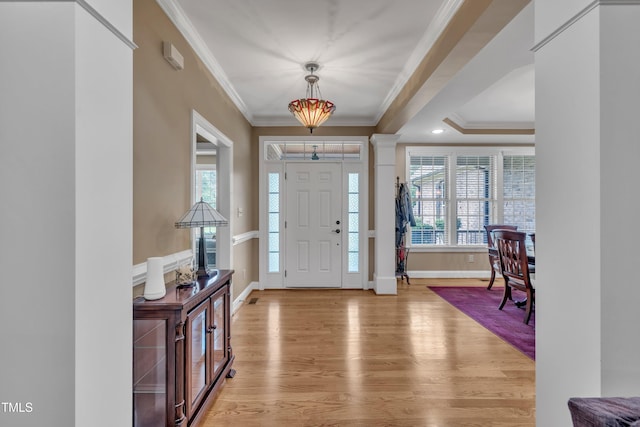 3728 Marwick Ct, Wendell, NC 27591 - entryway with crown molding, light wood-style flooring, plenty of natural light, and recessed lighting