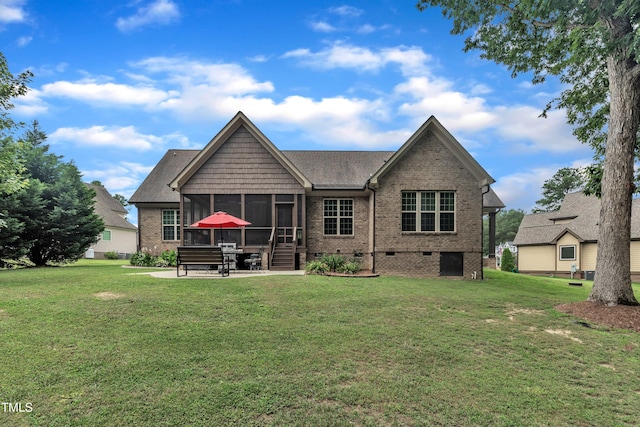 3728 Marwick Ct, Wendell, NC 27591 - back of house featuring crawl space, brick siding, a sunroom, and a lawn