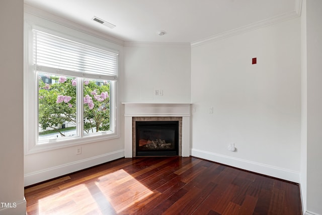400 W Rosemary St Unit 114, Chapel Hill, NC 27516 - unfurnished living room featuring a fireplace, wood finished floors, and crown molding