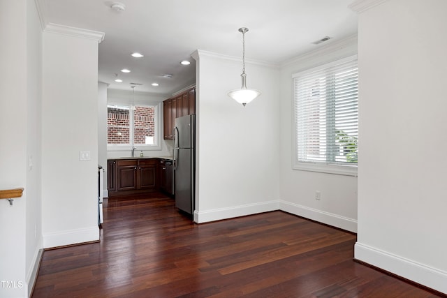400 W Rosemary St Unit 114, Chapel Hill, NC 27516 - kitchen with freestanding refrigerator, dark wood-style flooring, pendant lighting, recessed lighting, and ornamental molding