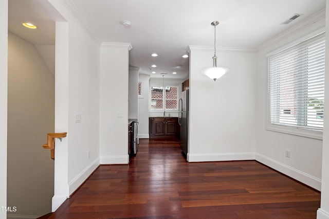 400 W Rosemary St Unit 114, Chapel Hill, NC 27516 - unfurnished dining area with dark wood-style floors, recessed lighting, and ornamental molding