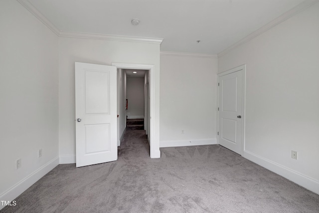 400 W Rosemary St Unit 114, Chapel Hill, NC 27516 - unfurnished bedroom with carpet and crown molding