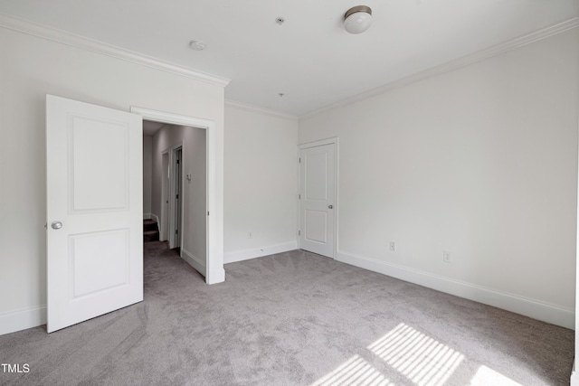 400 W Rosemary St Unit 114, Chapel Hill, NC 27516 - unfurnished bedroom featuring carpet floors and crown molding