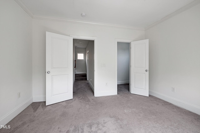 400 W Rosemary St Unit 114, Chapel Hill, NC 27516 - unfurnished bedroom with carpet and ornamental molding