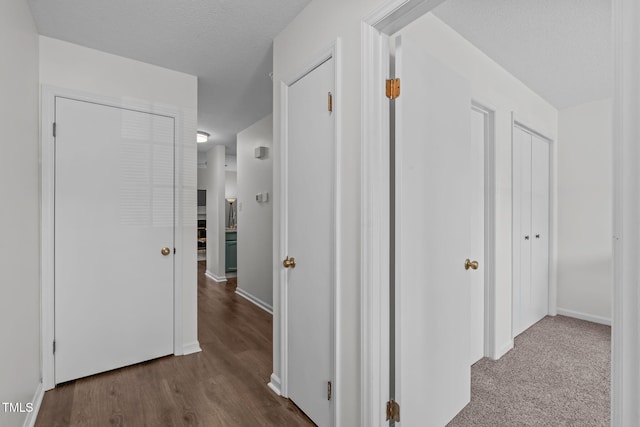11 Stone Village Ct, Durham, NC 27704 - corridor featuring wood finished floors and a textured ceiling
