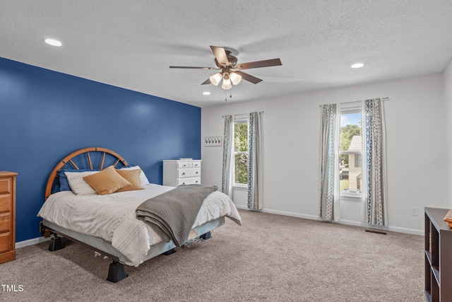 11 Stone Village Ct, Durham, NC 27704 - carpeted bedroom with recessed lighting, a textured ceiling, and a ceiling fan