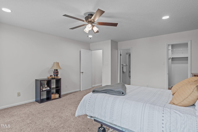 11 Stone Village Ct, Durham, NC 27704 - bedroom featuring recessed lighting, carpet floors, a textured ceiling, ceiling fan, and a walk in closet