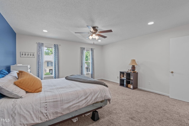 11 Stone Village Ct, Durham, NC 27704 - carpeted bedroom featuring recessed lighting, a textured ceiling, and ceiling fan