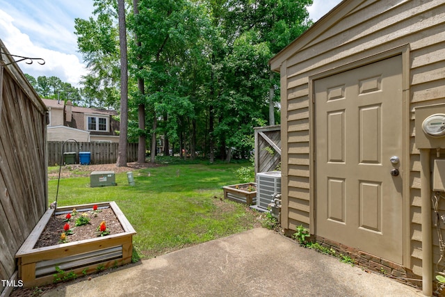 11 Stone Village Ct, Durham, NC 27704 - view of yard with a garden and a patio area