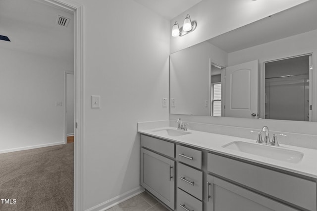 1414 Arena Ln, Fuquay Varina, NC 27526 - full bath featuring double vanity and baseboards