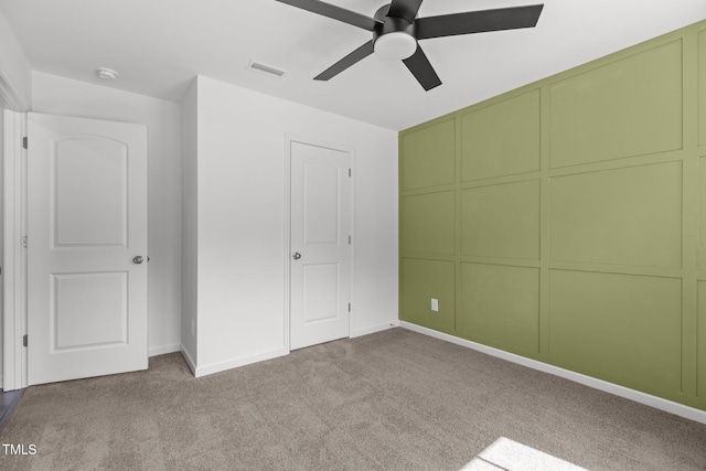 1414 Arena Ln, Fuquay Varina, NC 27526 - unfurnished bedroom featuring carpet floors, a ceiling fan, and a closet