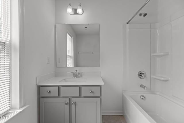 1414 Arena Ln, Fuquay Varina, NC 27526 - bathroom with vanity, shower / tub combination, and tile patterned flooring