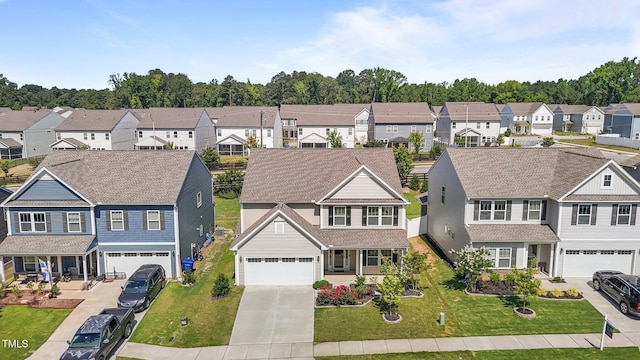 1414 Arena Ln, Fuquay Varina, NC 27526 - view of front of property with a residential view, driveway, a porch, and a front lawn