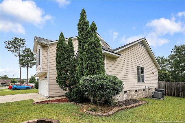 104 Somerset Dr, Raeford, NC 28376 - view of property exterior with driveway, an attached garage, and crawl space