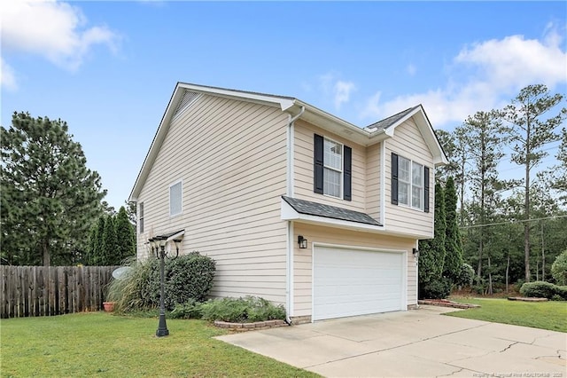 104 Somerset Dr, Raeford, NC 28376 - view of side of home featuring an attached garage and driveway