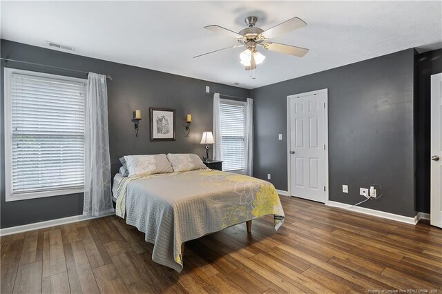 104 Somerset Dr, Raeford, NC 28376 - bedroom with wood-type flooring and ceiling fan