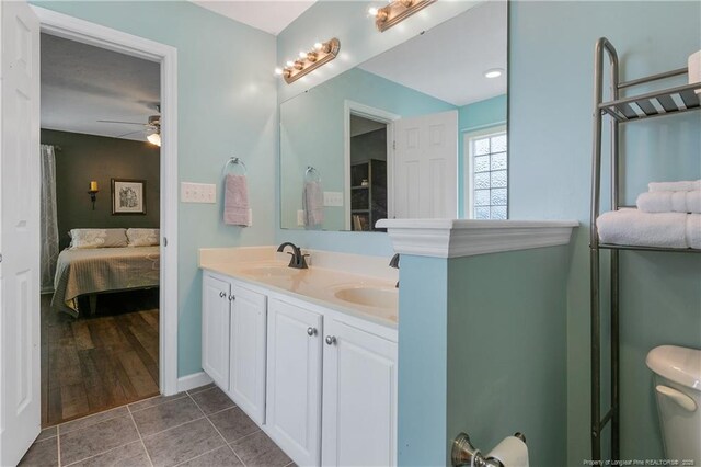 104 Somerset Dr, Raeford, NC 28376 - full bath with double vanity, ceiling fan, ensuite bathroom, and tile patterned floors