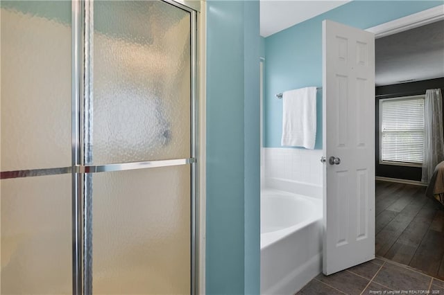 104 Somerset Dr, Raeford, NC 28376 - full bath with a bath, a shower stall, ensuite bathroom, and tile patterned floors
