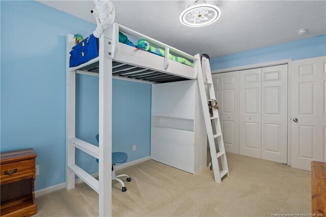 104 Somerset Dr, Raeford, NC 28376 - unfurnished bedroom featuring carpet flooring and a closet
