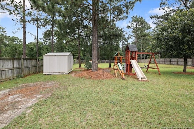 104 Somerset Dr, Raeford, NC 28376 - fenced backyard with a shed, a playground, and view of scattered trees