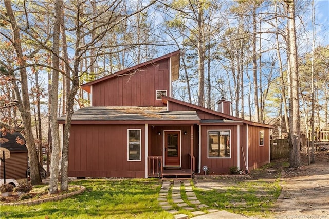 329 Whipple Tree Ln, Fayetteville, NC 28314 - view of front of home featuring a chimney and a shingled roof