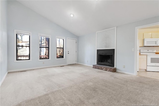 329 Whipple Tree Ln, Fayetteville, NC 28314 - unfurnished living room featuring light colored carpet, a fireplace with raised hearth, and vaulted ceiling