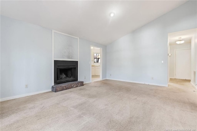 329 Whipple Tree Ln, Fayetteville, NC 28314 - unfurnished living room with carpet flooring, a fireplace with raised hearth, and lofted ceiling