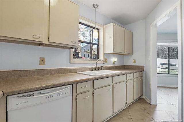 329 Whipple Tree Ln, Fayetteville, NC 28314 - kitchen featuring dishwasher, light tile patterned flooring, and pendant lighting