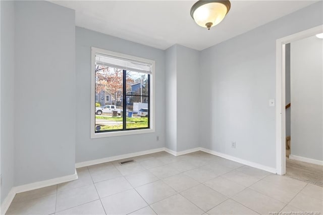 329 Whipple Tree Ln, Fayetteville, NC 28314 - empty room with baseboards and light tile patterned flooring
