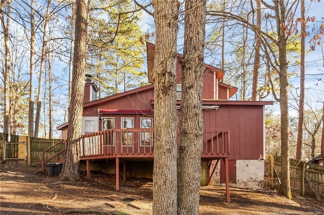 329 Whipple Tree Ln, Fayetteville, NC 28314 - back of property with a wooden deck and a chimney