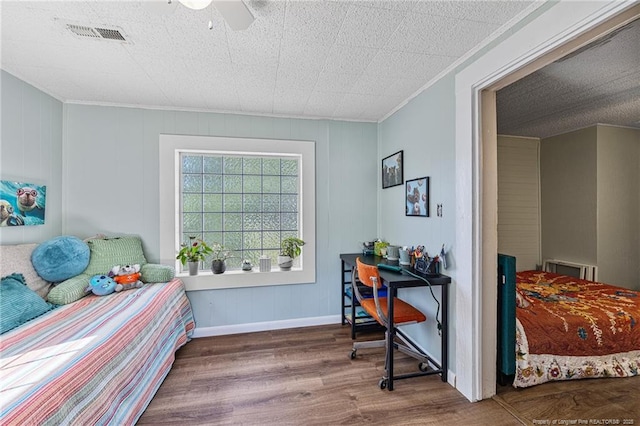 944 Cain Rd, Saint Pauls, NC 28384 - bedroom featuring wood finished floors, crown molding, and ceiling fan