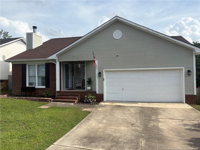 5931 Gist Pl, Fayetteville, NC 28306 - single story home featuring brick siding, driveway, a front yard, a chimney, and an attached garage