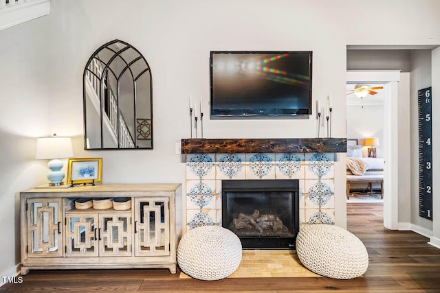 42 Juneberry Dr, Chapel Hill, NC 27516 - living area with wood finished floors, a tile fireplace, and ceiling fan
