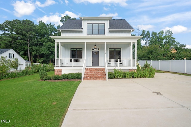 5107 Overhill St, Raleigh, NC 27603 - bungalow-style home featuring board and batten siding, covered porch, and roof with shingles