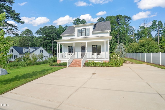 5107 Overhill St, Raleigh, NC 27603 - view of front of home with a porch, board and batten siding, a shingled roof, and stairway