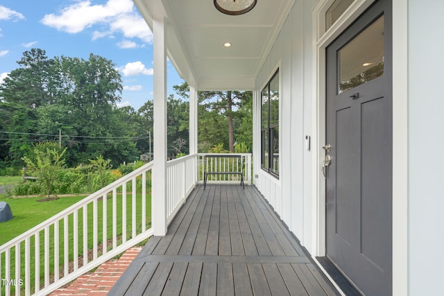 5107 Overhill St, Raleigh, NC 27603 - wooden porch featuring a yard