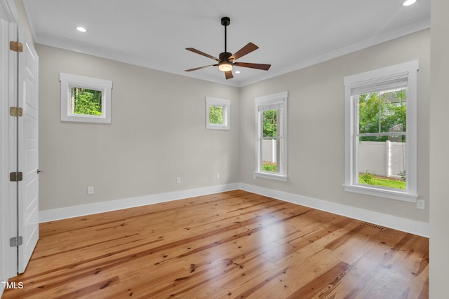 5107 Overhill St, Raleigh, NC 27603 - empty room featuring light wood-type flooring, healthy amount of natural light, ceiling fan, ornamental molding, and recessed lighting